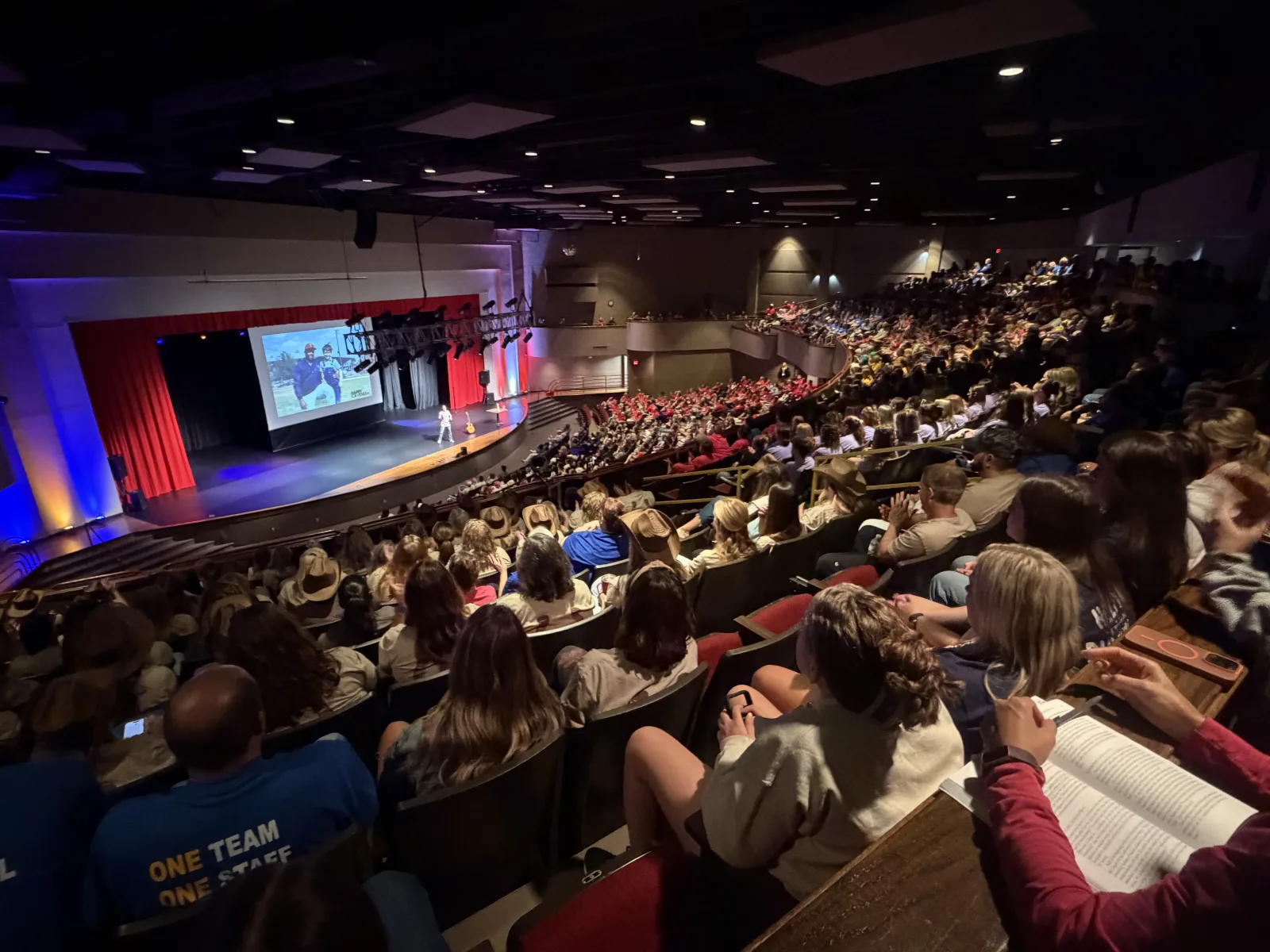 Audience filling the room at a live event